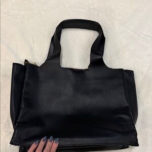 a new day Black Tote Bag